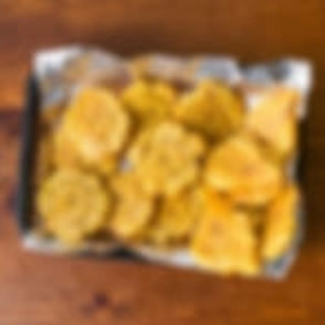 Fried Yellow Plantains (Tostones).